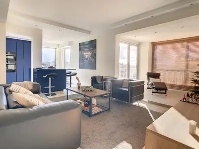 a living room with couches and a table at Penthhouse 1 & 2 bedroom apartment 2 mins from the Croisette 335 in Cannes