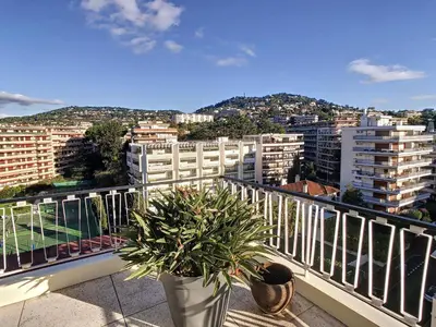 a balcony with a potted plant on top at Penthhouse 1 & 2 bedroom apartment 2 mins from the Croisette 335 in Cannes