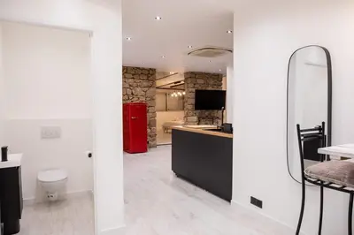 a living room with a couch and a table at 