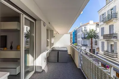 an apartment balcony with a view of buildings at Beautiful apartment with balcony - Center Cannes in Cannes