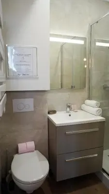 a bathroom with a toilet and a sink at Proche Carlton & Croisette, Appartement 301 - Palmazur Vacances in Cannes