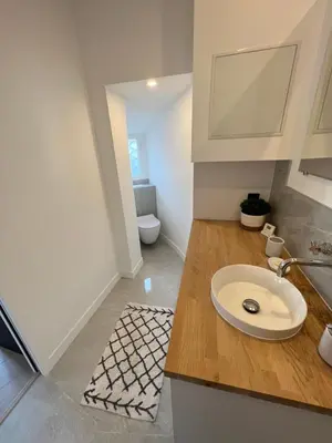 a bathroom with a sink and a toilet at Appartement 33 m2 comme une junior suite - vue Port et Palais des festivals in Cannes