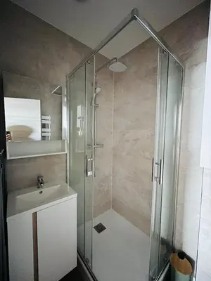 a bathroom with a shower and a sink at F1 neuf TURCKHEIM TUR102 in Cannes