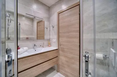 a bathroom with a tub and a sink and a shower at REF 1477 - Apartment for rent in Cannes