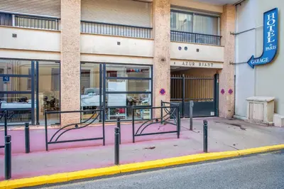 a building with a bike rack in front of it at Studio Merle - Welkeys in Cannes