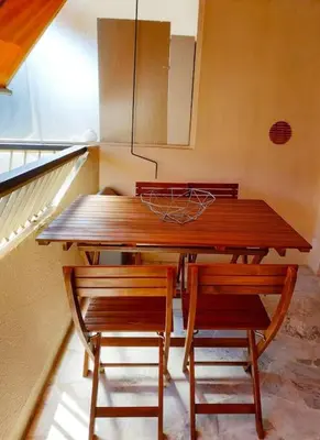 two chairs sitting next to each other in a room at Appartement proche croisette avec parking et climatisation in Cannes