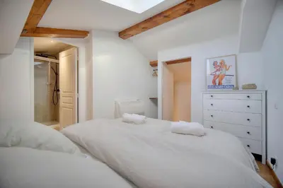 a bedroom with two white beds and a dresser at Beau 2 chambres TERRASSE, COEUR DU SUQUET-entre Port et Plages A2B238 in Cannes