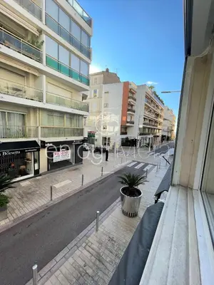 a view of a street in a city with buildings at 