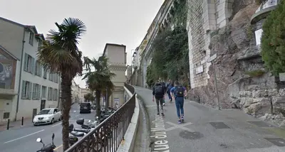 a group of people walking down a sidewalk at Mini Studio - Le Chevalier By SCLS Locations in Cannes