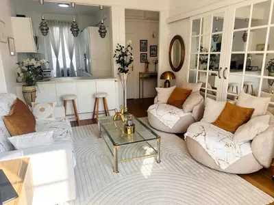 a living room with two couches and a coffee table at One Bedroom apartment in Cannes Center a few steps from the Croisette and the Martinez Hotel - 2032 in Cannes
