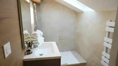 a bathroom with a sink and a mirror at Proche Carlton & Croisette, Appartement 401 - Palmazur Vacances in Cannes