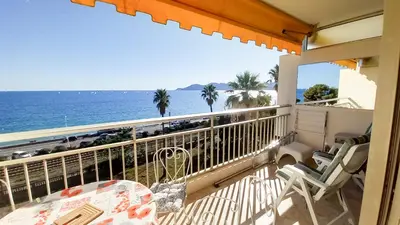 a balcony with a view of the ocean at Trident A in Cannes