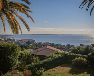 a view of the ocean from a house at Sublime appartement vue mer in Cannes