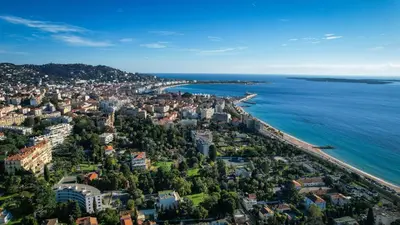 an aerial view of a city and the ocean at Sublime appartement vue mer in Cannes