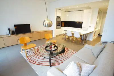 a living room with a couch and a table and chairs at Ref ANTIBES - Palmes d'Or Properties in Cannes