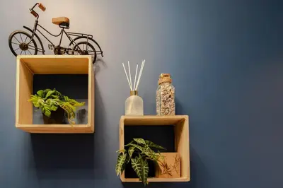 two wooden boxes with plants and a bike on a wall at C5 - 2 BDR Blvd Carnot - 10 min Palais - AC & Terrace Sea View in Cannes