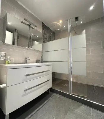 a bathroom with a shower and a sink at Charming 2 room , 52 m2, very spacious, bright and near sea Martinez hotel in Cannes