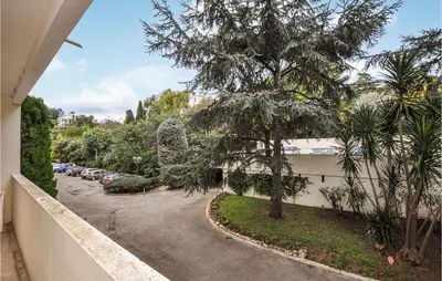 a view from a balcony of a parking lot at Beautiful Apartment In Cannes With Wifi in Cannes
