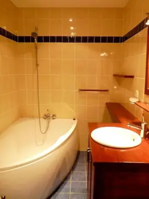 a bathroom with a tub and a toilet and a sink at Stylish one bedroom apartment in Central Cannes just off the Croisette and near beaches - 680 in Cannes
