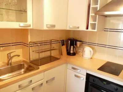 a kitchen with a sink and a counter top at Stylish one bedroom apartment in Central Cannes just off the Croisette and near beaches - 680 in Cannes