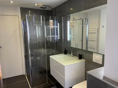 a bathroom with a shower and a sink and a toilet at Magnifique Modern appartement avec terrasse FERN12 in Cannes