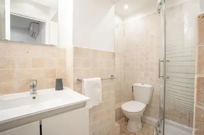 a bathroom with a toilet and a sink and a shower at Centre Cannes - 5 Mins Des Plages Et Du Palais ! - Joseph Méro in Cannes