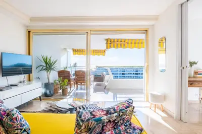 a living room with a view of the ocean at 2-Br in high Residential Property in Cannes