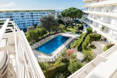 an apartment with a swimming pool in a building at 2-Br in high Residential Property in Cannes