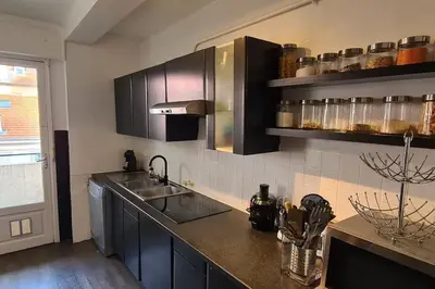a kitchen with a sink and a counter top at CENTRE, 3P/TERRASSE , 300 m PLAGES. in Cannes