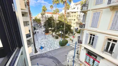 a view from a window of a street in a city at Modern 2 Bd Next To Rue Dantibes in Cannes