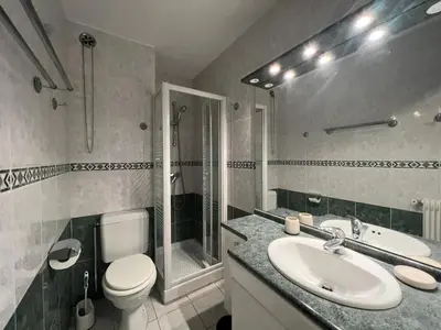 a bathroom with a sink and a toilet and a shower at LM Studio by Welcome to Cannes in Cannes