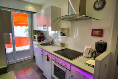 a kitchen with a sink and a counter top at Ref JUAS - Palmes d'Or Properties in Cannes