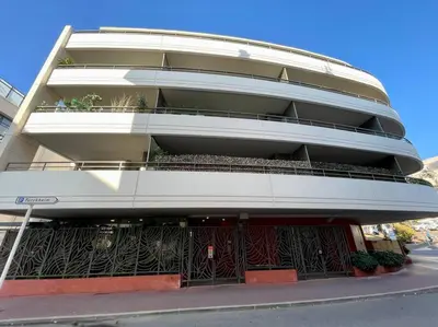 a round building with a balcony on a street at 2 pièces près de la Croisette in Cannes