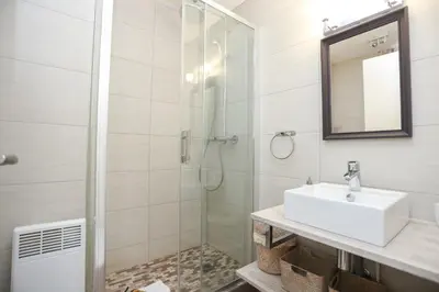 a bathroom with a sink and a shower at IMMOGROOM - Duplex with air conditioner - 5 min from the beach - Suquet in Cannes
