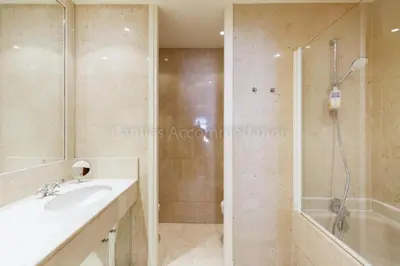 a bathroom with a shower and a sink and a shower at GRAY 4f1 in Cannes