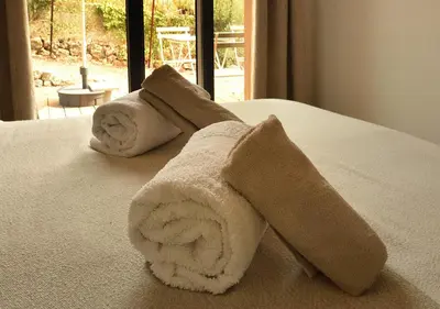 a towel animal made out of towels on a bed at La Villa d’Emma in Mougins