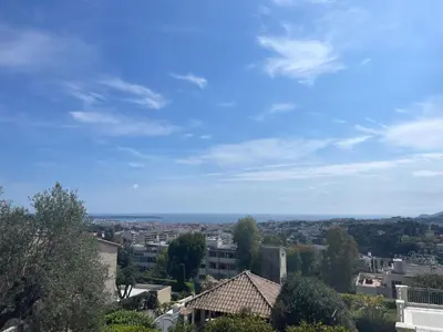 a view of a city under a blue sky at La Villa d’Emma in Mougins