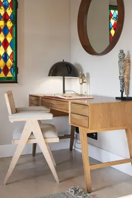 a wooden desk with a chair and a mirror at Cannes magnifique villa vue mer basse Californie in Cannes