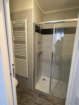 a shower with a glass door in a bathroom at Cannes Studio situé dans la résidence Gallia Historique in Cannes