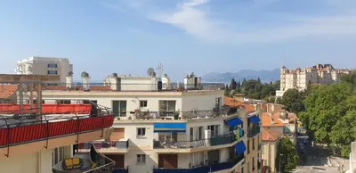 a group of buildings with balconies on top of them at Charming Stanislas Studio with Wi-Fi and Air Conditioning in Cannes