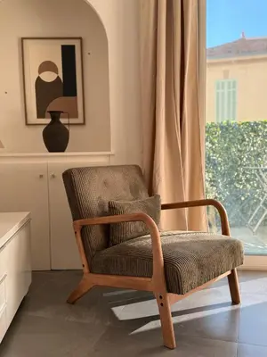 a bedroom with a large bed with blue lights at Cannes CROISETTE - plages - palais - bord de mer - Appartement moderne et lumineux avec balcon in Cannes