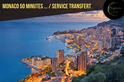 a view of a city with a river and a city at L'atelier des Artistes -Écrin de sérénité au coeur de Cannes - Balcon - Clim - Wifi in Cannes