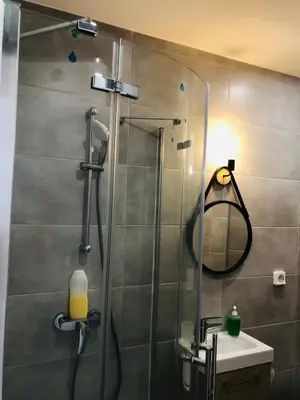 a shower with a glass door in a bathroom at Ciel de Cannes in Cannes