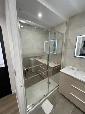 a bathroom with a shower and a sink at Modern and pleasant apartment in the heart of the city in Cannes