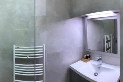 a bathroom with a sink and a mirror at Cannes Centre - 500m Palais de Festival - Banane in Cannes