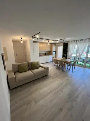 a living room with a couch and a table at Montfleury cannes in Cannes