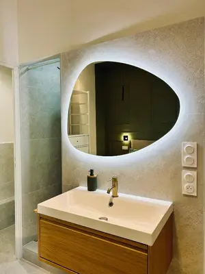 a bathroom with a sink and a mirror at KOSY Spa, Les Princes in Cannes