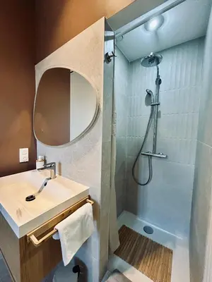 a bathroom with a sink and a shower at KOSY Spa, Les Princes in Cannes