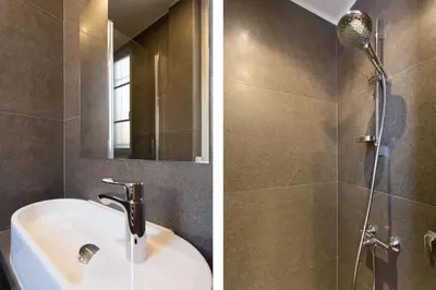 a bathroom with a sink and a shower at Cannes Heart of town 2 BR perfect congress & Holidays by Olam Properties in Cannes