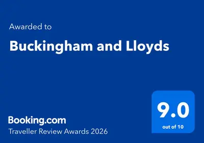 a blue sign with the words bulkingham and lysos at Buckingham & Lloyds - Cannes in Cannes